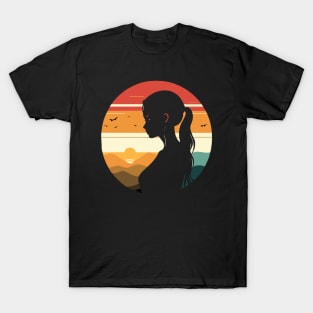 A T-shirt featuring a silhouette of a girl and stunning colors inspired by the sunset. T-Shirt